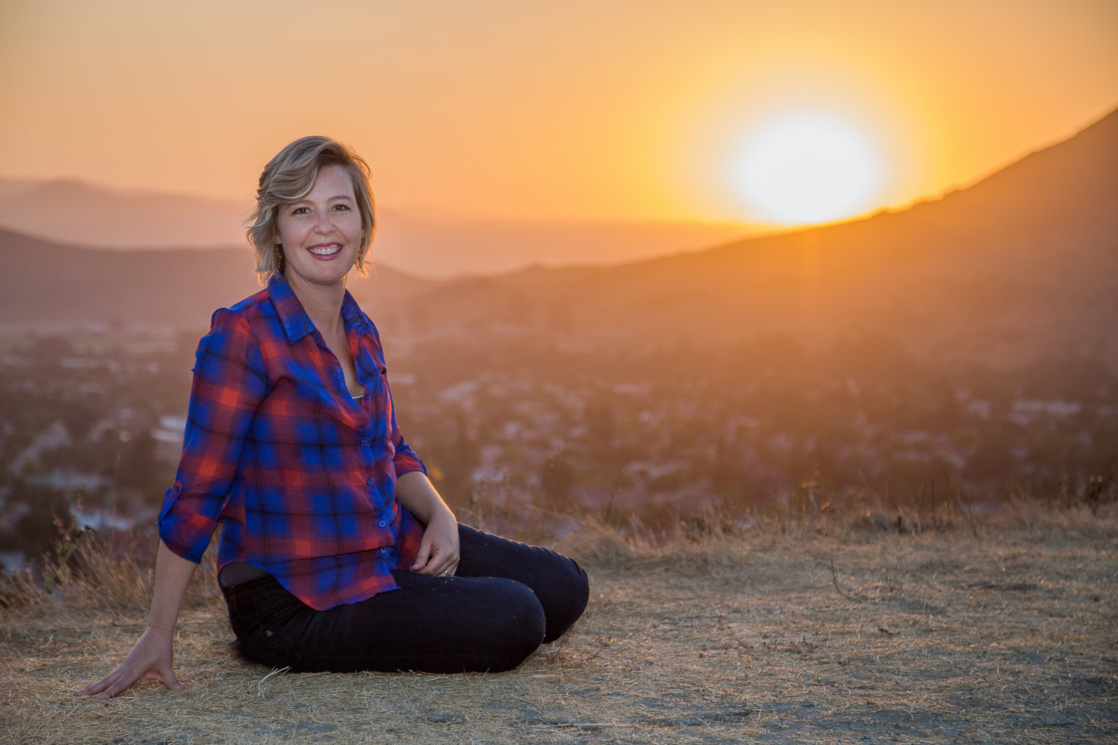 Lindsey Rice overlooking San Luis Obispo at sunset
