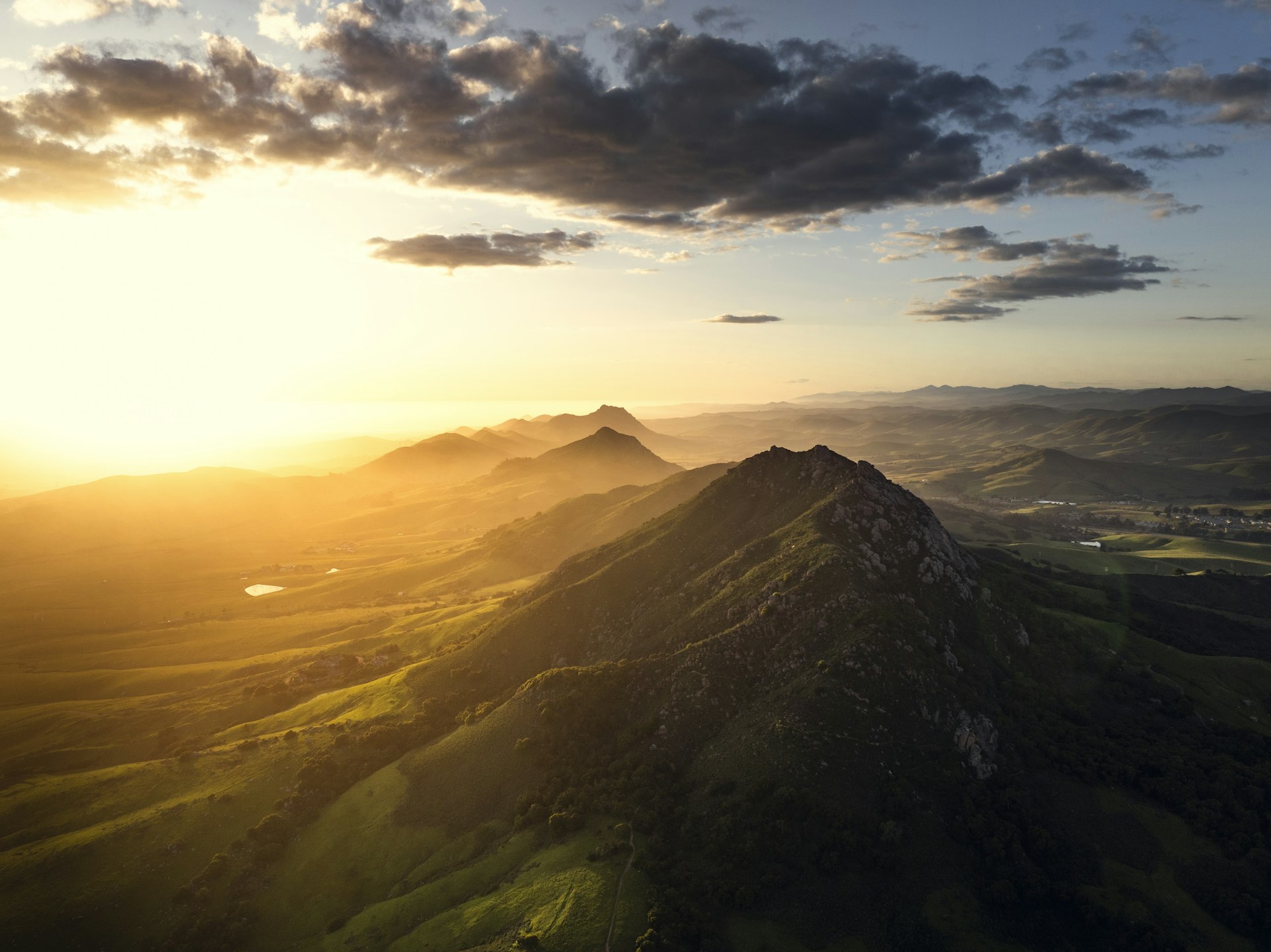 The green peaks above San Luis Obispo glowing at sunset